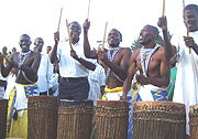 Premier Makuza participating in traditional drumming with Rushaki intore cultural troupe on Friday. (Photo/ A.Gahene).