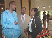 Youth Minister Protais Mitali (L), Imbuto Foundationu2019s Radegonde Ndejuru (R) and Senator Wellars Gasamagera in conversation during the Youth Forum meeting at Serena.(Photo.J.Mbanda).