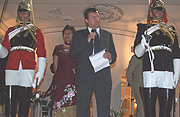 British Ambassador Nicholas Canon delivers his remarks as his wife looks on, during the celebrations to mark Queen Elizabethu2019s 83rd birthday in Kacyiru. (Courtesy photo).