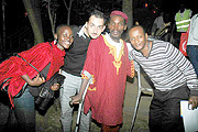 A film crew from Kenya, Kenyau2019s film star Egregious Jitu and Rwanda Cinema Centreu2019s CEO Eric Kabera (Right) pose for a group photo during a film screening at Shokola. (Photo, by John Mbanda).