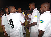 The six visiting Stars discuss strategies before Mondayu2019s Charity game against Amavubi Stars. Amavubi won the game 4-0. (Photo / J. Mbanda)