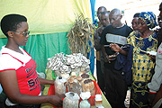 Rural farmers visiting the on going Agricultural expo at Mulindi in Gasabo District, inquire about how Mashrooms grown. (Photo J Mbanda)