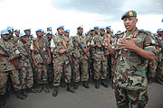 Gen. Nyamvumba addressesing troops who had just returned from the peace keeping mission in Darfur (file photo)