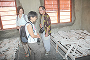 Anne Marie Truc (L) with fellow delegates at Murambi Genocide Memorial site.(Photo/ J Mbanda)