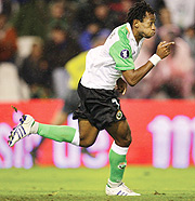 IN-DEMAND: Meme Tchite celebrates after scoring for Racing Santander in the Uefa Cup against Schalke 04 of Germany. The striker is yet to make up his mind regarding which nation he wants to play for. (Net photo)