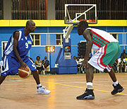 Aboubacar Barame (L) will be a huge loss for Marine if he does not feature in the Fiba-Africa Club qualifiers. Here, he was playing Rwanda during the Zone 5 championship early this year.