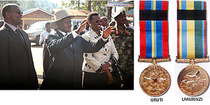 Ugandau2019s President Yoweri Museveni (2nd left) and his wife Janet Museveni greet residents of Gatuna on arrival at the border post yesterday. Museveni will be one of the heads of state to be honoured during todaysu2019 liberation celebrations (Photo J Mbanda).