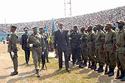 President Paul Kagame inspects a guard of honor mounted by the Rwanda Defense forces at the 11th anniversary of Rwanda Liberation day cerebrations at Amahoro stadium in Kigali. 4th July 2005. 