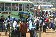 Passengers bord Kampala bound noon bus