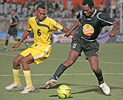 TP Mazembeu2019s Kabangu Mulota (right) is challenged to the ball by Benadiru2019s Ibrahim Ahmed in a match Mazembe won 8-1. Both side will be fighting for survival today. (Photo/ Cecafa)