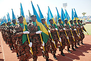 Flag bearers lead the parade at the Liberation Day ceremonies