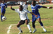 DEBUT: Ndjoli Bokungu battles with Rayon Sport  defender Aimable Rucogoza on his debut last year.
