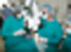 Doctors Major John Nkurikiye (L)  and Geoff Tabin carrying out the eye operation yesterday at King Faisal Hospital (Photo J Mbanda)