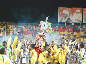 Sports Minister Joseph Habineza leads Atraco players in celebrating yesterdayu2019s CecafaKagame Cup Final win. Atraco beat Sudanese giants El Merreikh 1-0 to win the trophy for the first time. (Martha/ Ayuro)