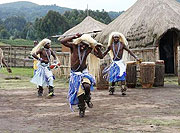 Warriors do a traditional dance, called an Intore, at the Ibyu2019wacu Cultural Village. Many used to be involved in the illegal animal trade, but learned ancient arts that they share with visitors and Rwandans alike.(Photo by DAN ROBSTON)