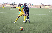 Atracou2019s Andre Lomami tries to hold off Policeu2019s Tambwe Ngoyi in yesterdayu2019s MTN Peace Cup quarter-final second leg. Atraco won the contest 1-0. (Photo: F. Goodman)