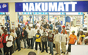 People gather at the entrance of Nakumatt-UTC during one of the raffles organised by the store (File Photo)