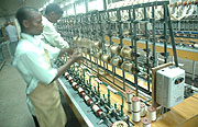 Workers at the UTEXERWA. Rwanda is a magnet for investors