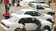 A man bargains with a cab driver on one of Kigaliu2019s busy streets (File photo)