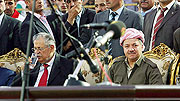 Iraqi President Jalal Talabani, left, and Massoud Barzani, president of the Kurdish regional government in Iraq, attend a launch rally for the regionu2019s parliamentary campaign season on June 25, 2009
