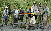 Minners at the entrance  of a mine(file photo)