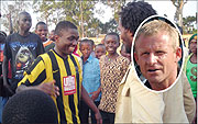 Mukura FC goal scorer Birori Daddy celebrates with the fans after the final whistle. (Inset) Erik Paske. (Photo / P. Ntambara)