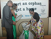 Foreign Affairs Minister Rosemary Museminali contributes to One Dollar to mark the launch of the campaign in April (File Photo)