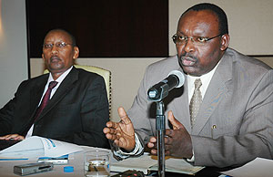 National Bank Governor Francois Kanimba (R) and Parmanent secretary in the Ministry of Finance John Rwangombwa at a press briefing after the meeting (Photo J Mbanda)