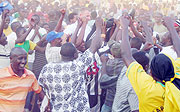 AIR BORNE: Jubilant APR fans lift their coach Erik Paske high in the air after the Dutchman led the military side to the league title on the last day of the season. (Photo: P. Ntambara)