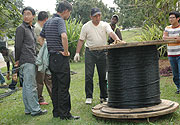 Chinese technicians lay fibre optic cables in Kigali(File photo).