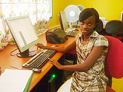 Uwinana Brandine pausing before her PC