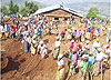 Residents of Gihembe Cell participate in clearing plots and constructing houses for needy people during Umuganda period (photo A Gahene).