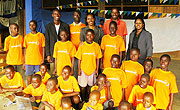 L-R Pastor Sylvestre Nzitukuze, Cleophas Kabasiita, Celestin Mitabu with some of the orphans.