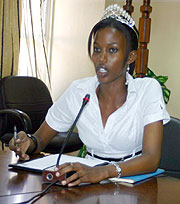 Miss Kigali speaking during One Dollar Campaign