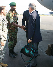 Col. Charles Karamba welcomes Gen. Ashy upon his arrival yesterday as the US  Ambassador Stuart Symmington looks on. (Photo/ F. Goodman)