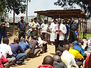 Hon Theobald Mporanyi and other district officials speak to inmates at Nyamabuye Police Station(Photo D.Sabiiti).
