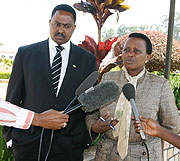 Visiting EAPCO chief Workneh Gebeyeher, looks on as his host,  Mary Gahonzire, addresses the media at police headquarters yesterday (Photo: F. Goodman).
