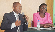 KCB Rwandau2019s Managing Director Maurice Toroitich (L) and Gloria Nyambok, Head of Banking Services (Photo/E.Mukaaya).
