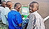 Rwandan children discovering the world through their computers