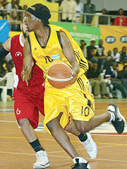 Rwandau2019s captain Hamza Ruhezamihigo in action against Egypt in the final of Zone 5 Championship held early this year in Kigali, which Egypt won. Yesterday Rwanda avenged that defeat with a 78-75 win in Libya.