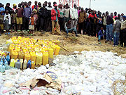 Residents in Cyanika gather to witness the destruction of illicit drugs on Sunday.