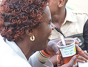 A reveller drinks SORWATHE tea during this yearu2019s expotition. (File Photo)