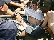 A settler youth fighting eviction