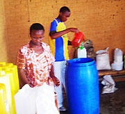 Juvenile  at work in a liquid soap industry in Gishari. (Photo S Rwembeho).