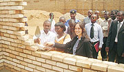 L-R Huye Mayor Francois Uhagaze, the Headmistress of Karama Primary School and Esther Kronsbein the Cordinator of Human Help Network during the launch of construction works of a 6 classroom block (Photo: P. Ntambara)