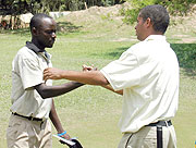Emmanuel Ruterana (L) being congratulated by one of his opponents after winning the 2007 edition of Rwanda Open.