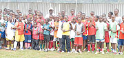 FOR THE FUTURE:  APR academy players pose for a group photo. At the back row in cap is their coach Rene Kalimunda. (file photo)
