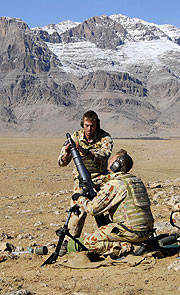 NATO troops preparing a mortar attack on suspected Taliban hideouts in Southern Afghanistan