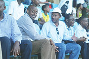 RETAINED: Senator Valens Munyabagisha (in hat) enjoys a local league match besides Ferwafa boss Jean Bosco Kazura (L) and Prime Minister Bernard Makuza last season. The senator was retained as Rayon Sport president despite earlier reports that he was plan