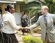First Lady Jeannette Kagame greets Evan Rice of Project San Francisco on arrival at the project offices yesterday (Photo J Mbanda)